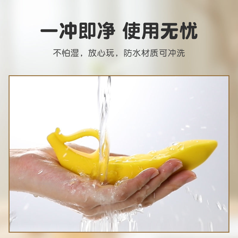 可爱造型顺滑弧度深处顶撞柔软硅胶女用香蕉手动按摩器